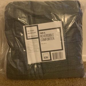 New in plastic! Twin XL reversible comforter